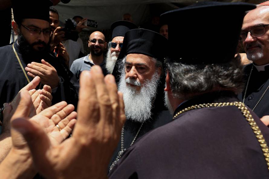 Members of the clergy visit the Greek Orthodox Saint Porphyrius Church, in Gaza City