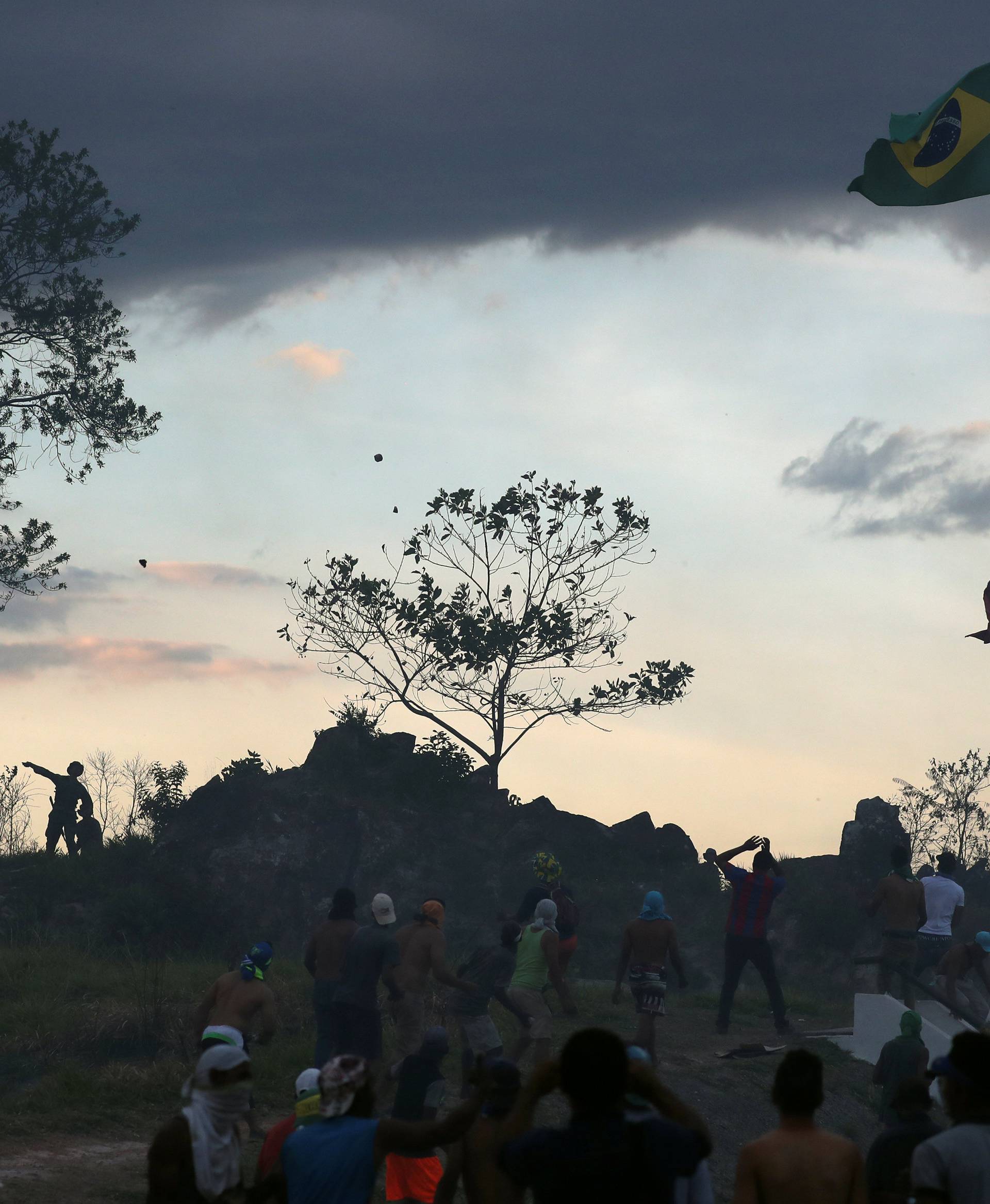 People clash with Venezuelan soldiers along the border between Venezuela and Brazil in Pacaraima, Brazil