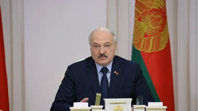 Belarusian President Alexander Lukashenko chairs a meeting in Minsk