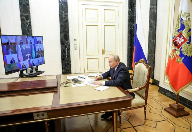 FILE PHOTO: Russian President Vladimir Putin chairs a meeting in Moscow