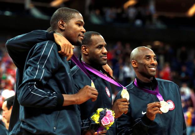 FILE PHOTO: Durant, James and Bryant pose with their gold medals during victory ceremony at the North Greenwich Arena during the London 2012 Olympic Games