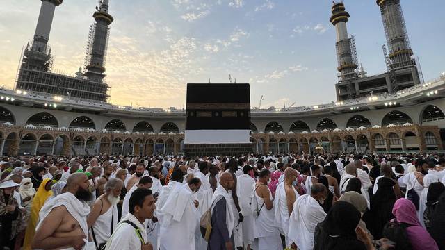 Muslim pilgrims perform the Umrah at the holy Kaaba, in the holy city of Mecca