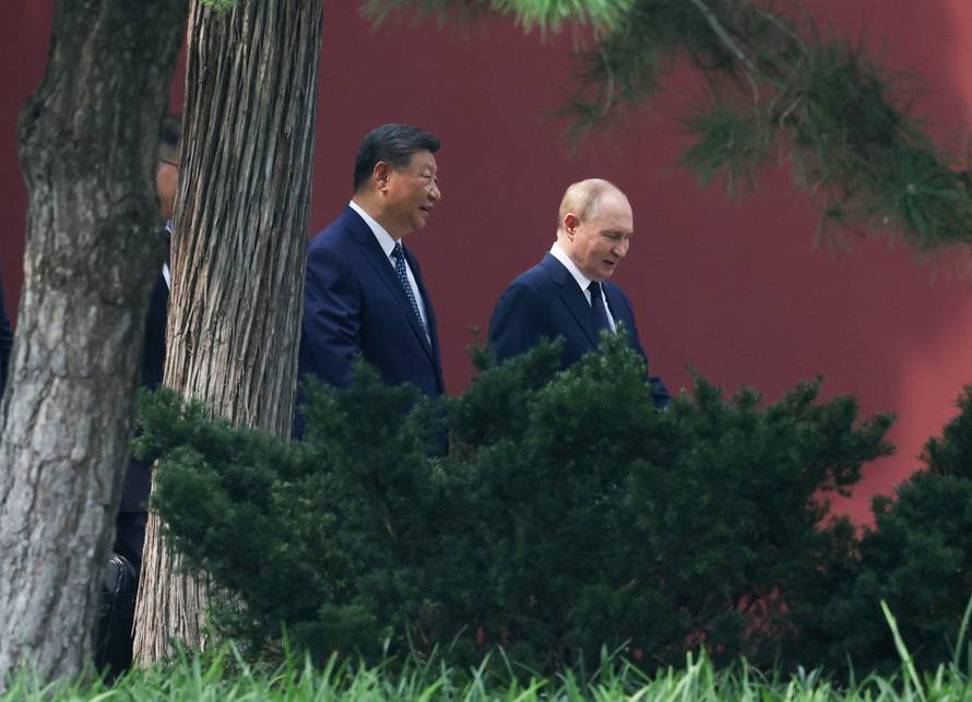 Russian President Vladimir Putin meets with Chinese President Xi Jinping in Beijing