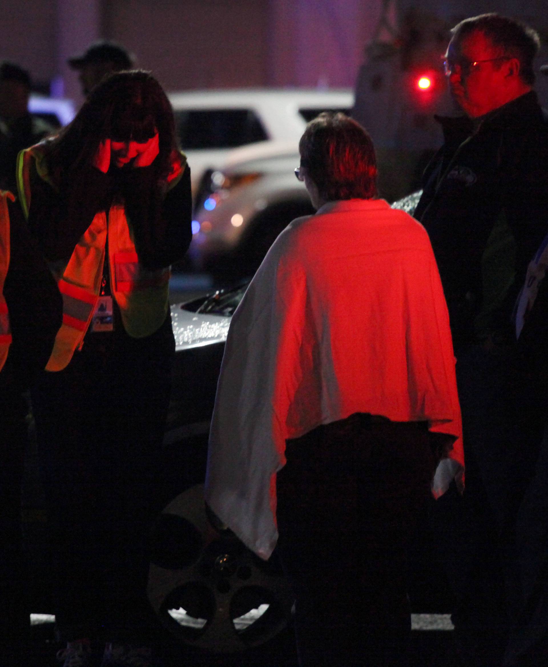 Authorities are pictured at the Cascade Mall following reports of an active shooter in Burlington, Washington