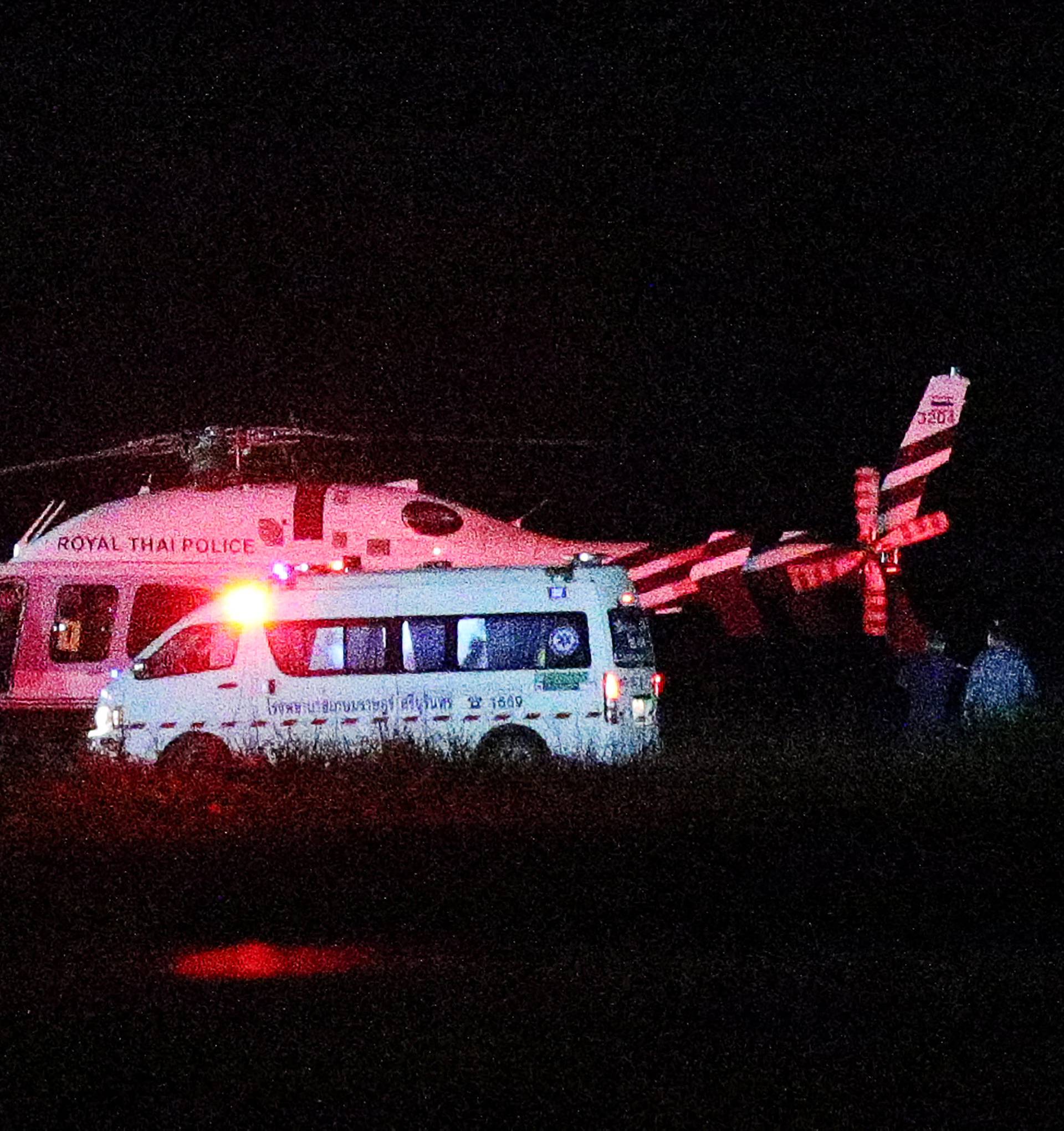 A Royal Thai Police helicopter carrying rescued schoolboys lands at a military airport in the northern province of Chiang Rai