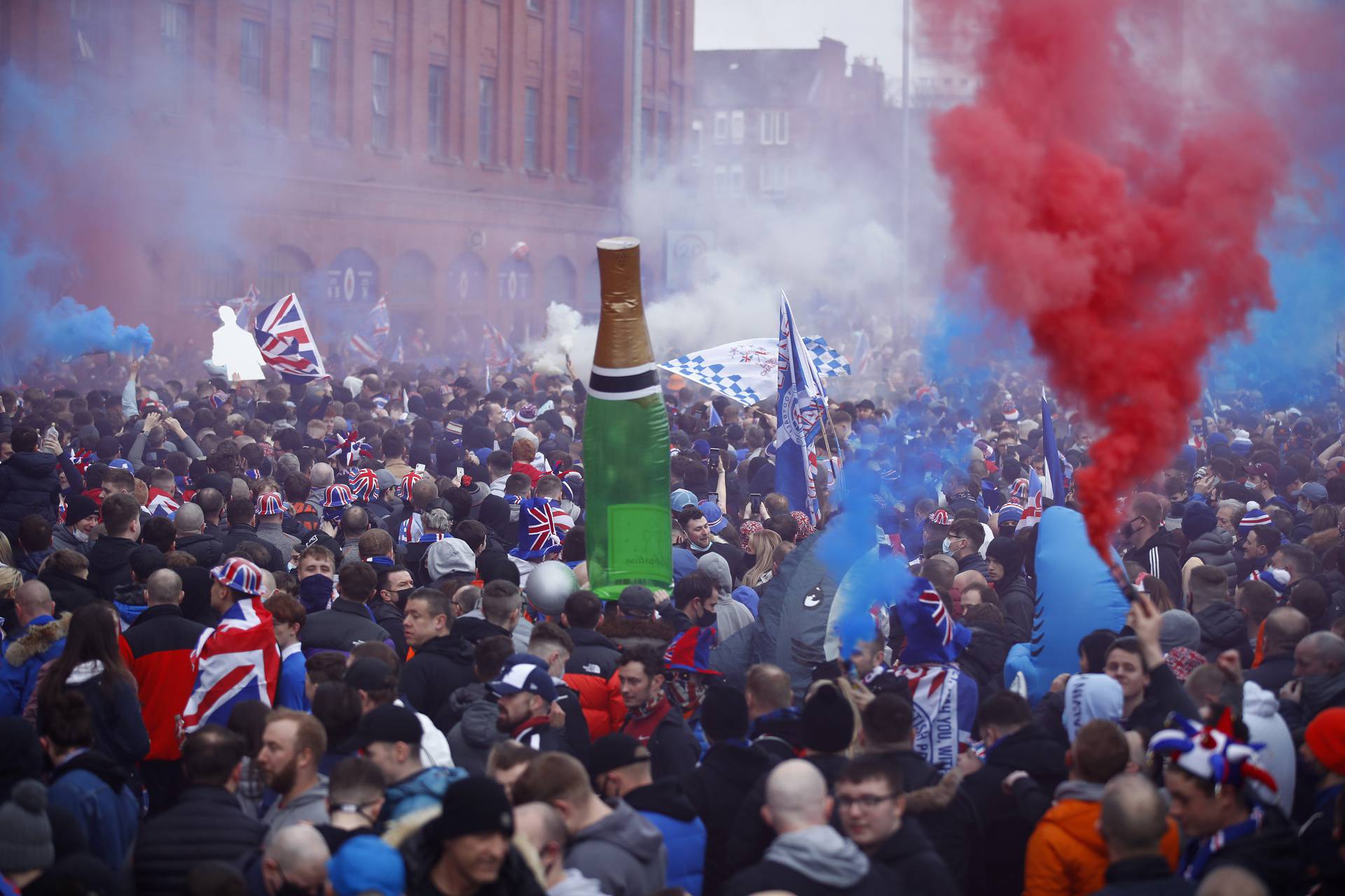 Rangers fans celebrate winning the Scottish Premiership Title