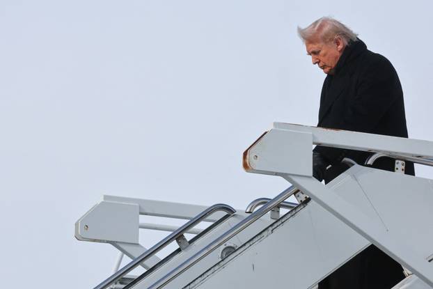 U.S. President Donald Trump participates a dignified transfer of the remains of two Iowa National Guard members, in Dover