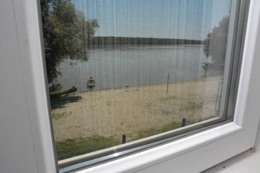 Dalj -  Brod-vikendica usidrena na obali Dunava u Dalju.