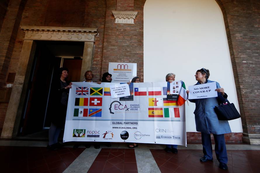 People demonstrate inside the headquarters of Benedictine Order in Rome