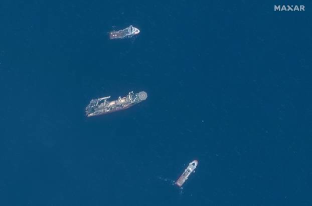 A satellite image shows ships taking part in the search and rescue operations associated with the missing Titan submersible near the wreck of the Titanic