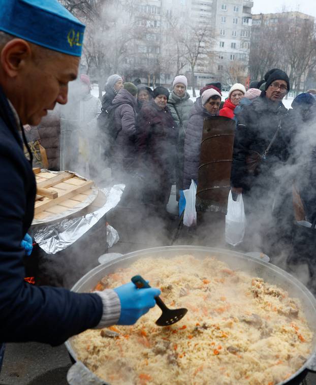 Residents cope with electricity, heating and water outages following Russian attacks on Ukraine's infrastructure in Kyiv