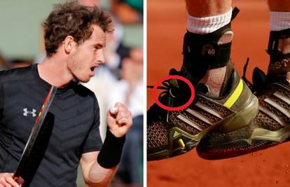 S burmom oko lijeve tenisice Andy Murray gazi sve redom