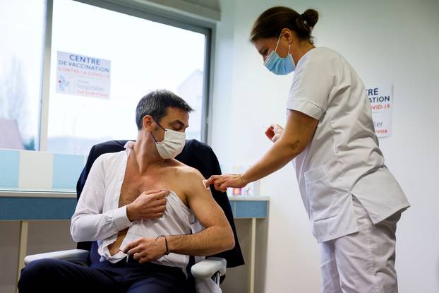French Health Minister Veran receives a dose of the AstraZeneca-Oxford COVID-19 vaccine, in Melun