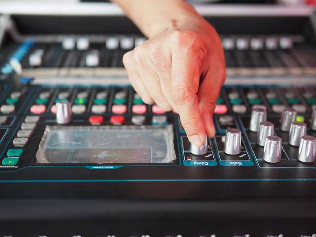 Hand,Of,Live,Performance,Audio,Engineer,Balancing,And,Adjusting,Sound