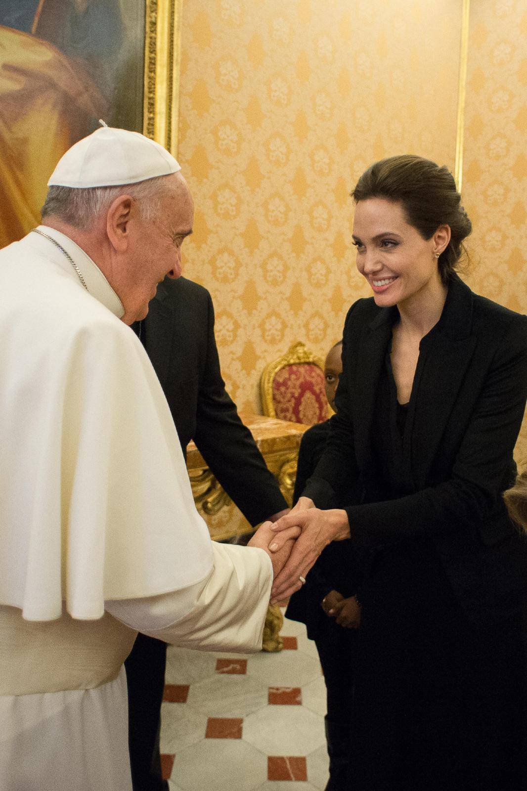 January 8, 2015: Pope Francis greets Angelina Jolie, at the Vatican.